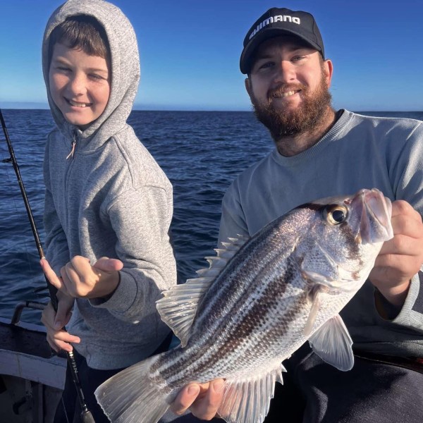 Derek Norris holding a fish