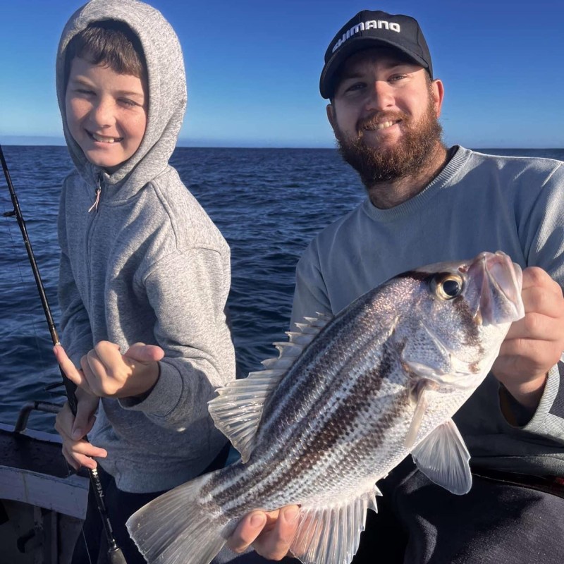 Derek Norris holding a fish