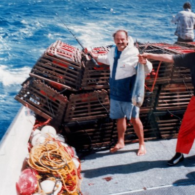 a group of people on a boat in the water