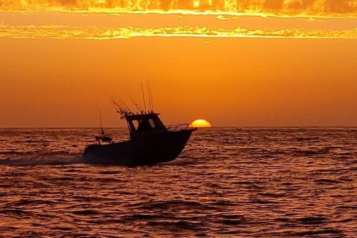 a sunset over a body of water