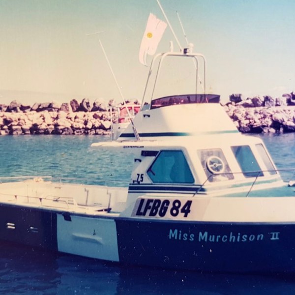 a small boat in a body of water